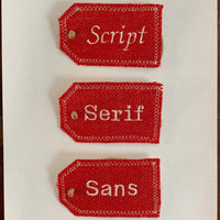 Red burlap mini tags with examples of Script, Serif, and Sans Serif fonts.